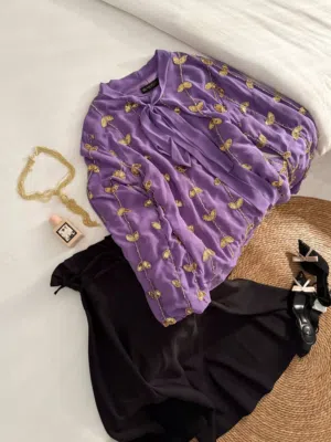 ملابس طقم نسائي