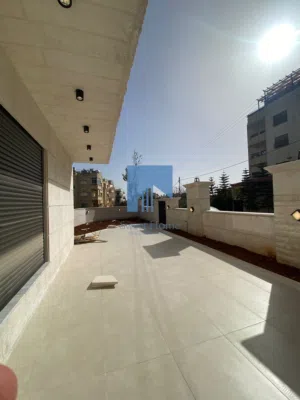 شقة أرضية فاخرة للبيع في خلدا  - خلف المستشفى السعودي 317م مع حديقة وترسات 150م لم تسكن