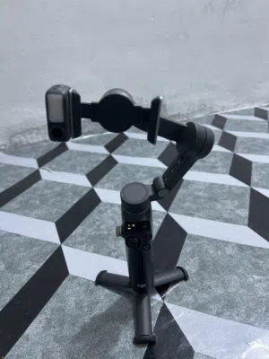 ساتاند تصوير دي جي اي dJi مستعمل 5 اشهر فقط وصرت بي قليل جدا كامل مواصفات كلشي بي جديد كل الملحقات