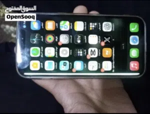 آيفون 12 مستعمل بحالة ممتازة بذاكرة 128 جيجابايت باللون الأبيض مع شاحن