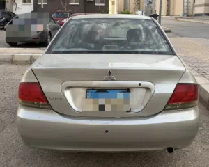 سياره لانسر ميتسوبيشي 2009 لمعرفة السعر تواصل مع رقم الهاتف