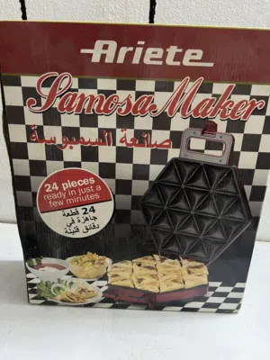 صانعة السمبوسة مثلثاث