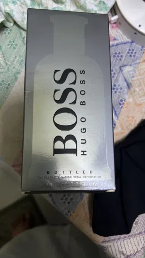 عطر بؤس الرجالي 200 ml متبقى النص
