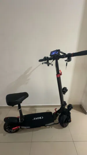 سكوتر كهربائي ويا كرسي مستعمل يمشي 70km من شركة crony بحاله ممتازه
