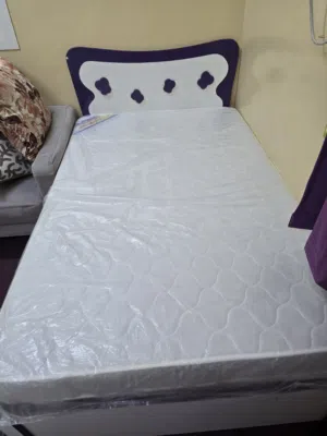 BED WITH NEW MATTRESS