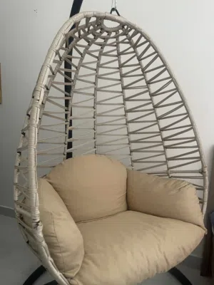 Cozy swing chair with a cushion