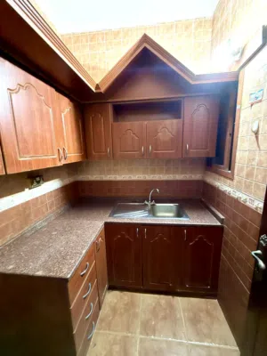 Studio unfurnished in Auzaiba near 18 November street behind shell oil