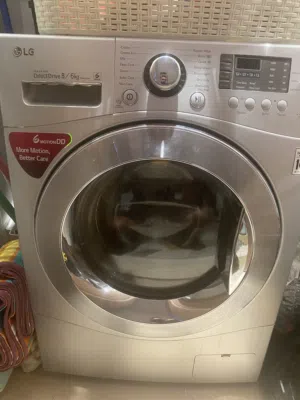 LG Front Load Washing Machine 6 Motion, 8kg - perfect Condition 10 y warranty