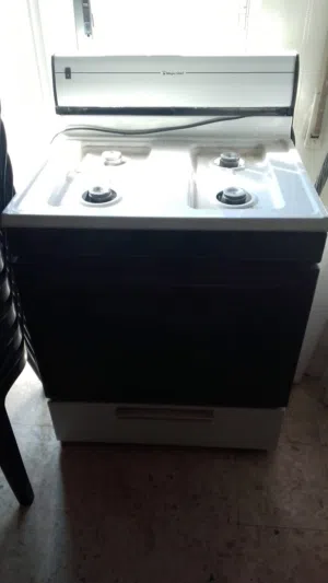 فرن أمريكي ماجيك شيف 4 عيون مع كهرباء و شعلة الكترونية