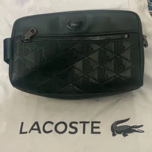 جنطة يديوية ماركة LACOSTE