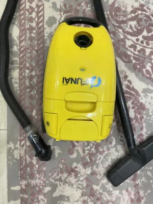مكنسة بسط كهربائية