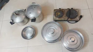 طناجر سيب وطناجر مقلوبة وغاز كهربائي