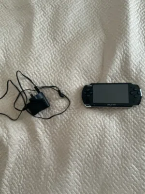 Psp 50 games with charger working good