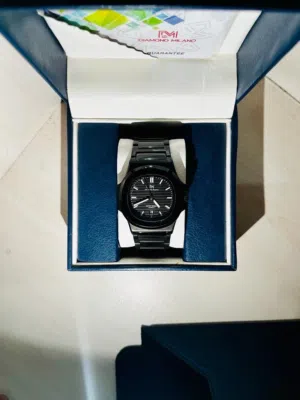 Diamond Milanese watch, luxurious black color.