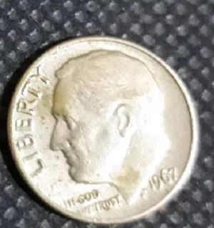 قبل 57 سنه =ربع دولار فضي اميريكي =جودة أنسر=سعر القطعة واحده = 100دينارالمهتم يتصل بالهاتف