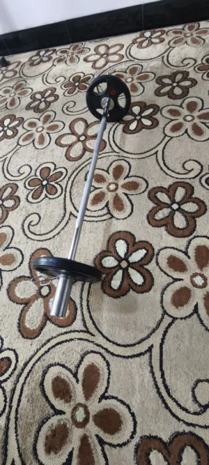 بار أولمبي اصلي مع قرصين اولمبي للبيع