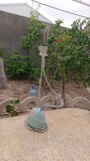 مكواة بخاري