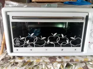 فرن كهربائي نوعية لوكسيل التركي استعمال بسيط جدا شبه جديد مع صينية مدورة وصينية مستطيلة بسعر 40دينار