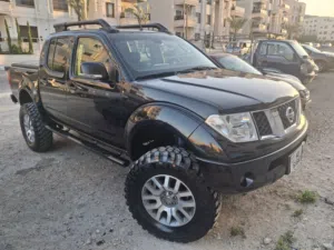 بكب نيسان نافارا 2007 ديزل معدل بالكامل مرفوع، مرخص ، حالة ممتازة، أوتوماتيك ، دهان و تنجيد جديد