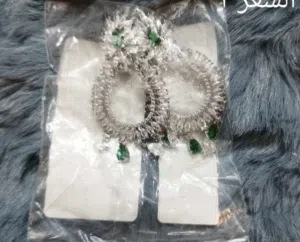 سوار الؤلؤ الطبيعي + تراجي كريستال والزمرد