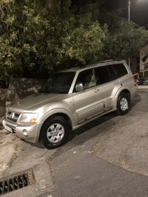 ميتسوبيشي باجيرو 2004 GLS خليجي أوتوماتيك مع مميزات متقدمة وحالة ممتازة