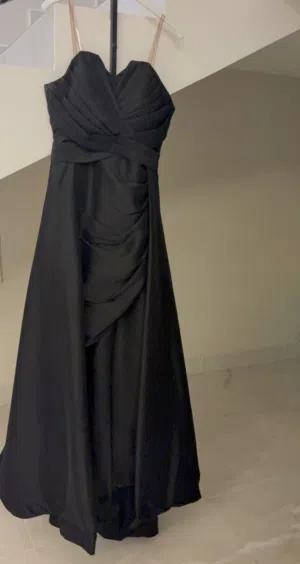 A black dress, worn once, size small, the number on the dress is 8, for sale for 35 Bahraini dinars.