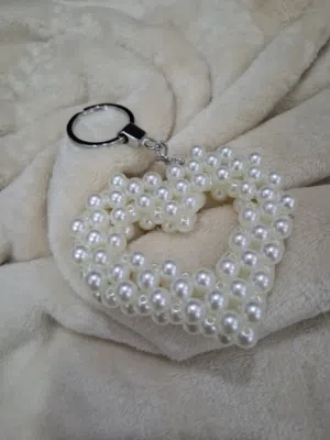 شنطة خرز وبوك خرز وميدالية خرز