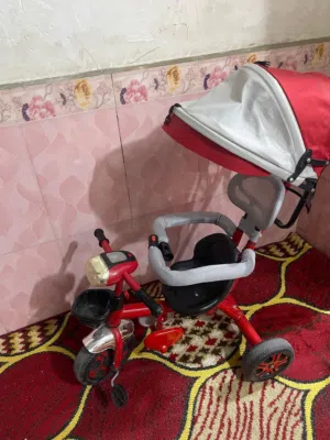 باسكل أطفال يصلح عربه وباسكل