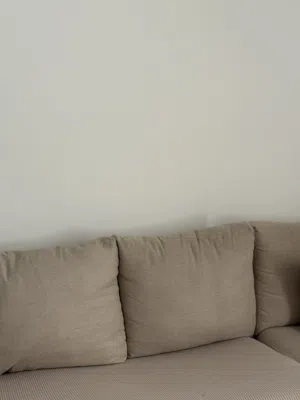 L- shaped beige color sofa for sale