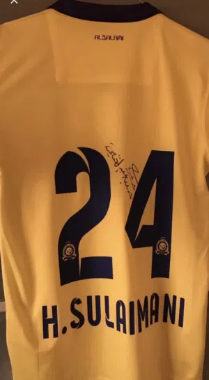 تيشيرت الاعب حسين عبدالغني