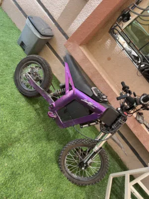 Kugoo  wish 01 2026 goes  90km and with Dongle and  light and bag and surron peg  With spare tire