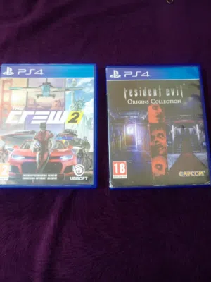 سيديات بلايستيشن 4  لعبة The crew 2  ولعبة Risdent evil