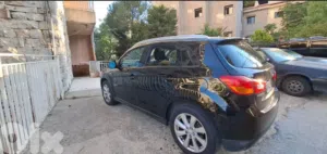 Mitsubishi . RVR . 2013 . Used1