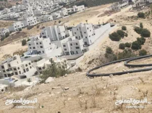 نمرة أرض قرب دابوق مقابل حدائق الحسين منطقه عاليه و مطله