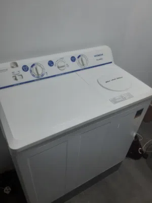 غساله وفريزر وموقد غاز وتسريحه وحامل ملابس