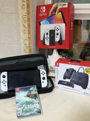 Nintendo Switch Oled with Nintendo Split Controller نينتيندو سويتش اولد مع اذرعة نينتدو