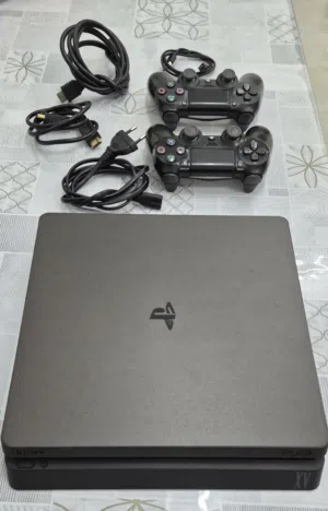 Sony PlayStation PS4 with two controllers - Excellent Condition