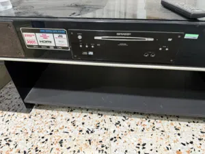 طاولة تيليڤزيون مدمجة بمنظومة هوم سينما Sharp