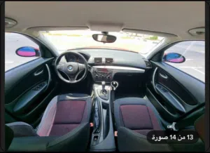 BMW 118i model 2009  180000 KM raning  red color good condition