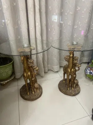 Twin golden clear glass tables
