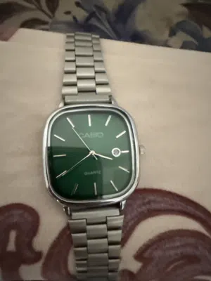 ساعة كاسيو خضراء أنيقة بحالة ممتازه