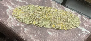 مفرش لاسيه دهبي مشغول بخيط السيرما العرض 35 سم في 72 سم الطول