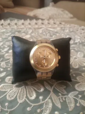 ساعة Swatch lrony أصلية – لون ذهبي مميز – بحالة ممتازة ستاتي