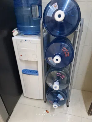 مبردة مياه مع حامل دبات الماء