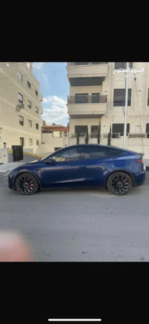 Tesla Y واعلى صنف  Model y performance  4جيد موديل 2022 فتحتة بونراما  مالك واحد  وارد امريكي