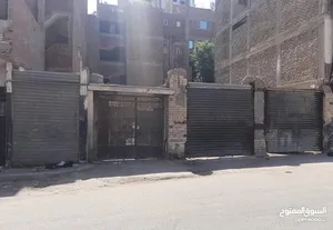 قطعة ارض فضاء حوالى 240 متر بين مدرستين على شارع 40 متر واجهة 12.7 متر