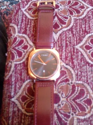 ساعة Tomi بحالة جيدة