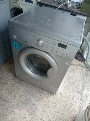 غساله ال جي لون رمادي بحالة الوكاله مطور انفيرتر