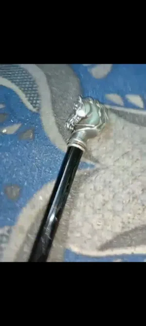 سيف مع غمده + عصى