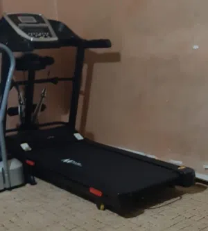جهاز ركض تريدميل MPlus مع حزام رجاج بحاله ممتازه للبيع
